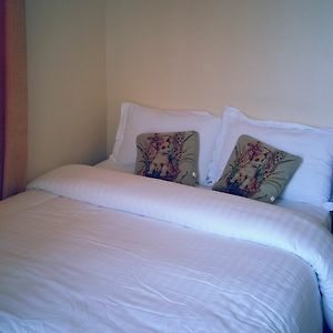 Kamer met een Queen Size Bed